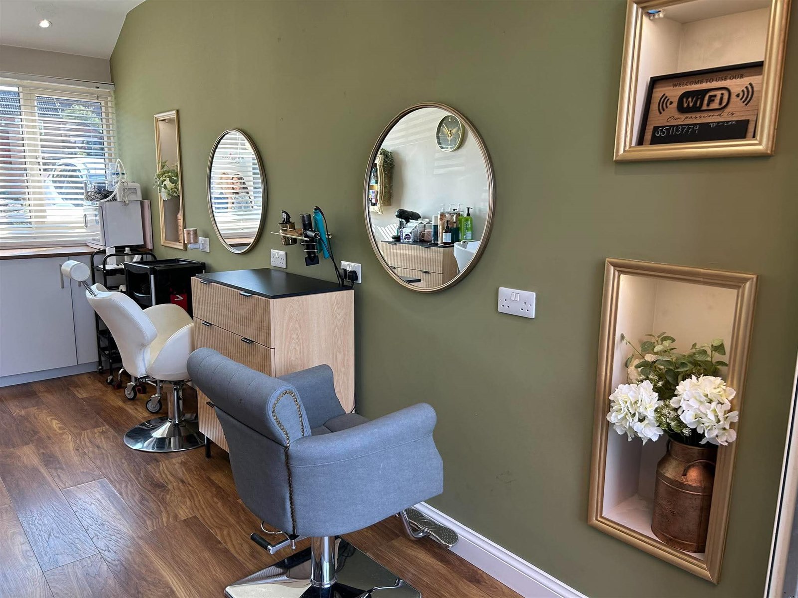 Crowning Glory styling station with mirrors and salon chair